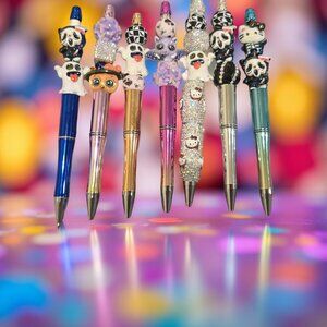 HELLO KITTY & HALLOWEEN PENS ~7$ EACH